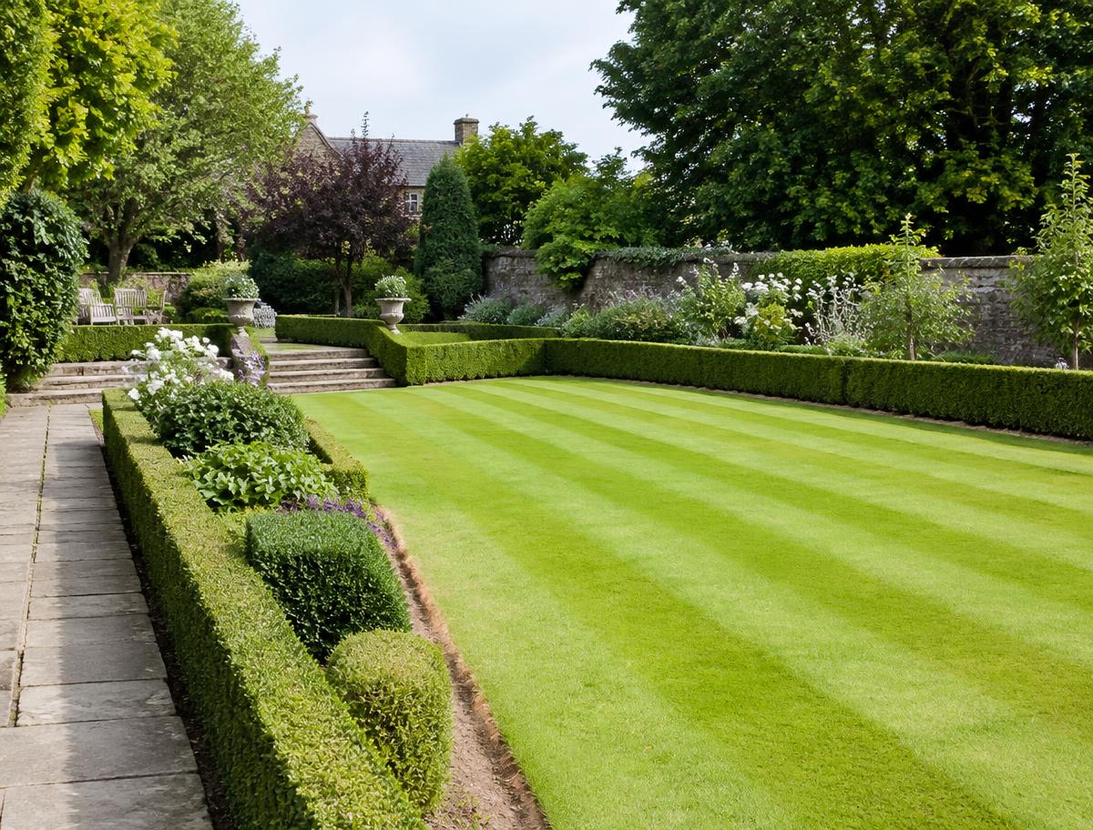 Well maintained English garden with clipped hedges